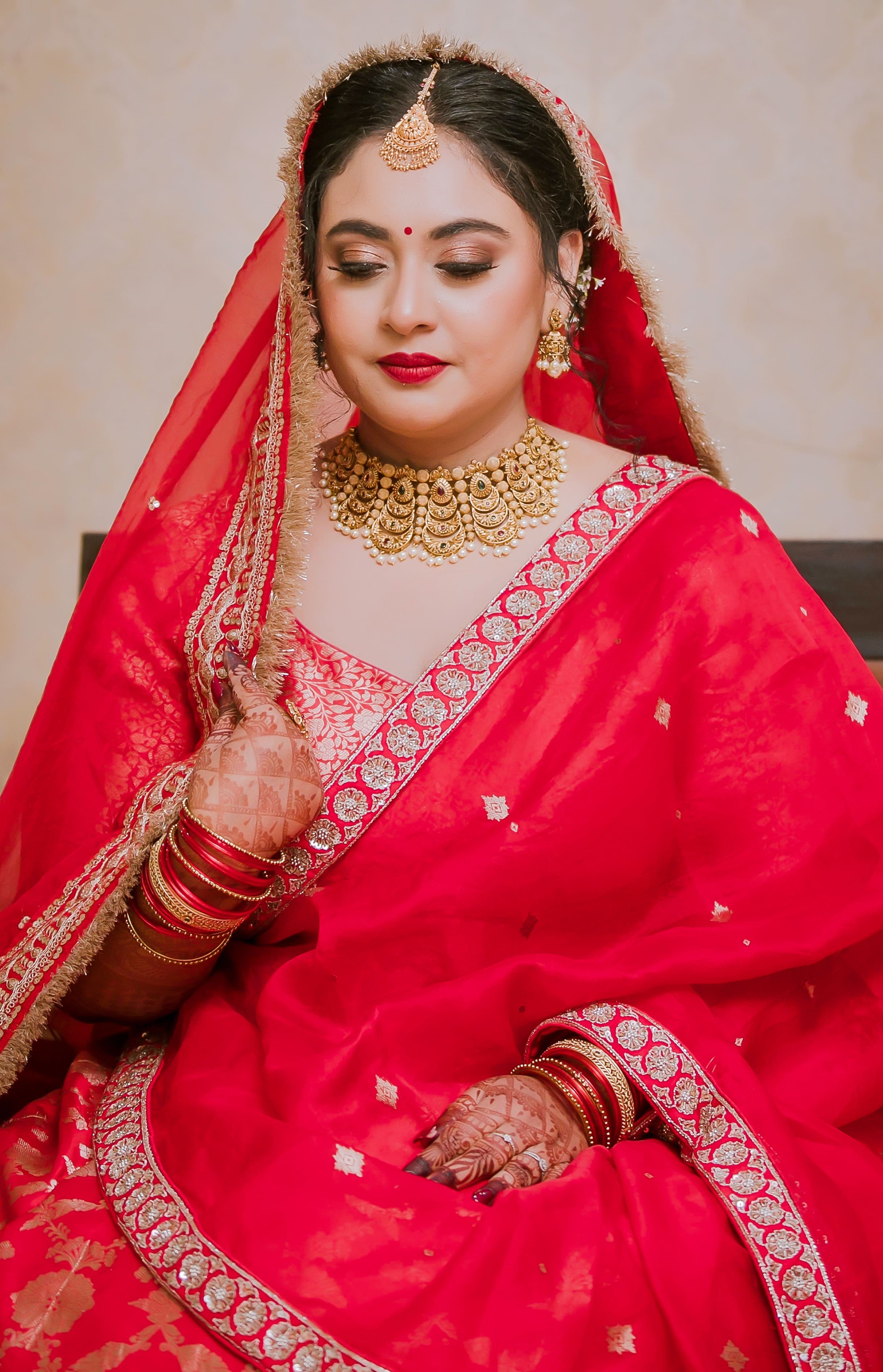 beautiful women in red blouse and golden lehenga traditional, gold jewelry,  curvy figure, beautiful detailed face, fair smooth skin, photo r... - AI  Generated Artwork - NightCafe Creator