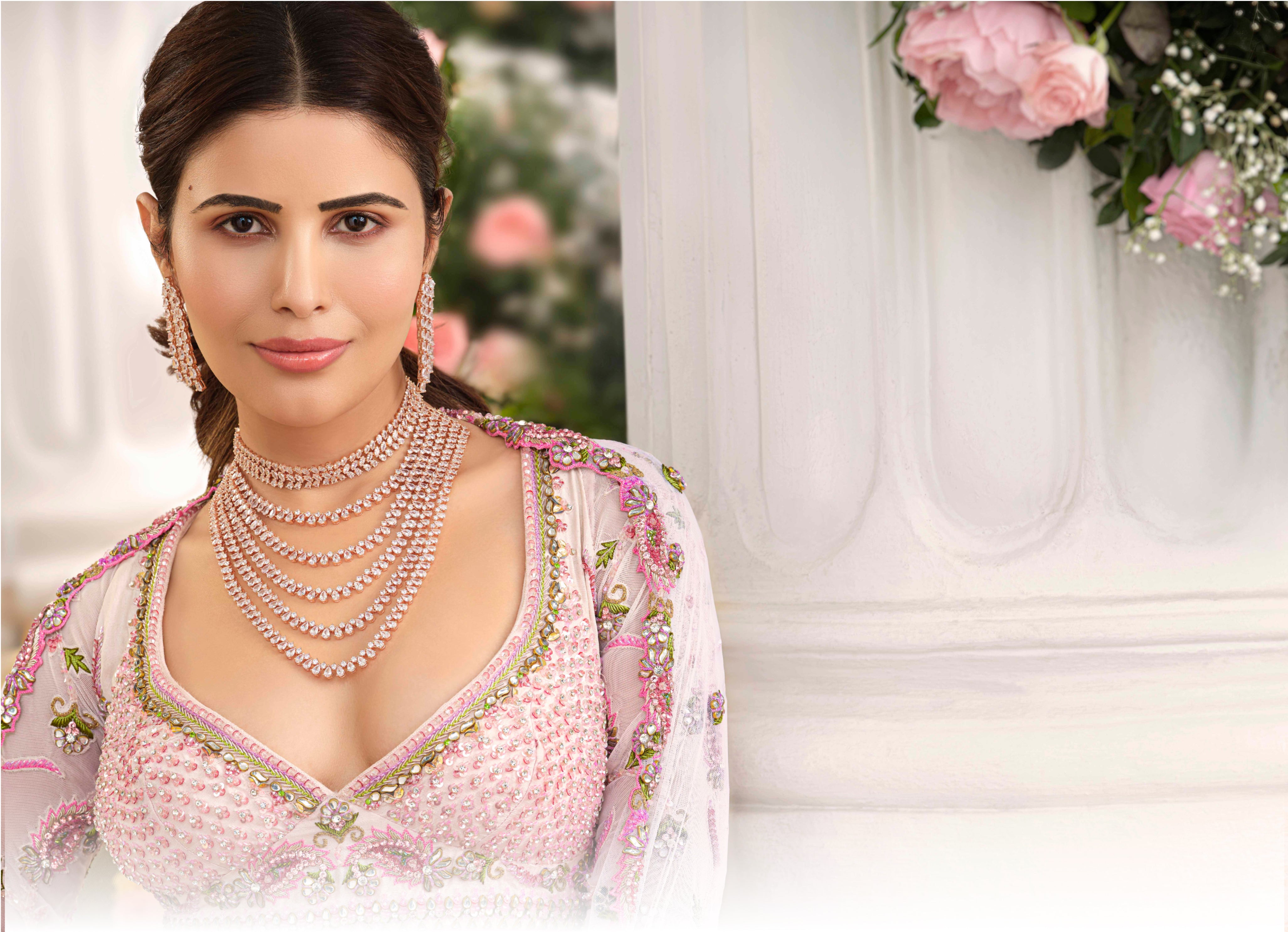 Bridal Asia - A subtle pink lehenga with striking emerald jewellery, has  made our heart skipped a beat! We love how this bride chose a classic  flushed make-up look & regal jewels
